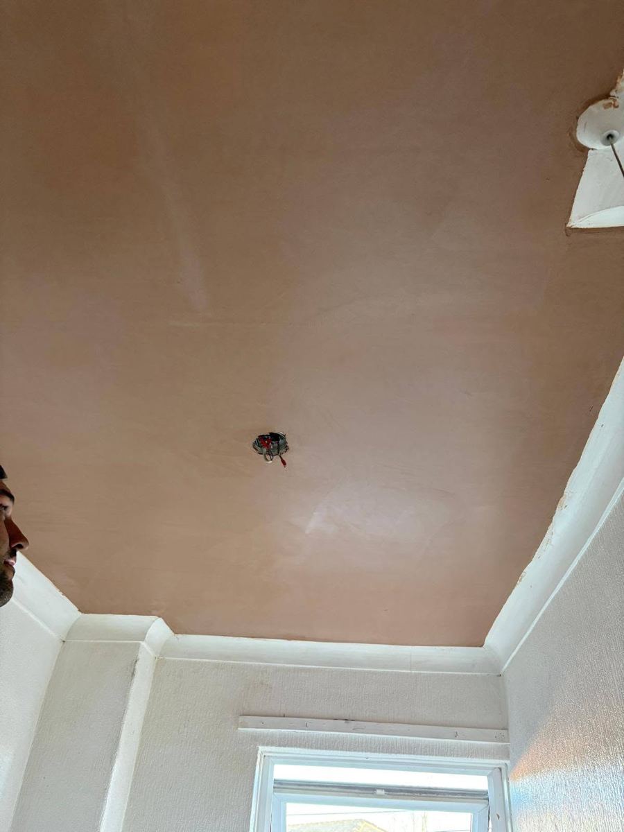 The same ceiling repaired and replastered